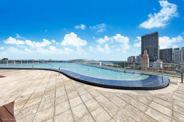 a view of a swimming pool with a lake view