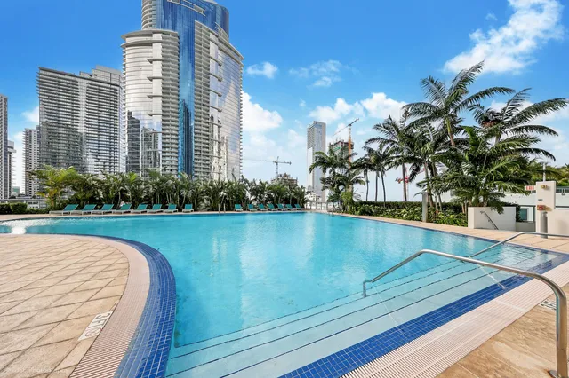 a view of a balcony with sitting area