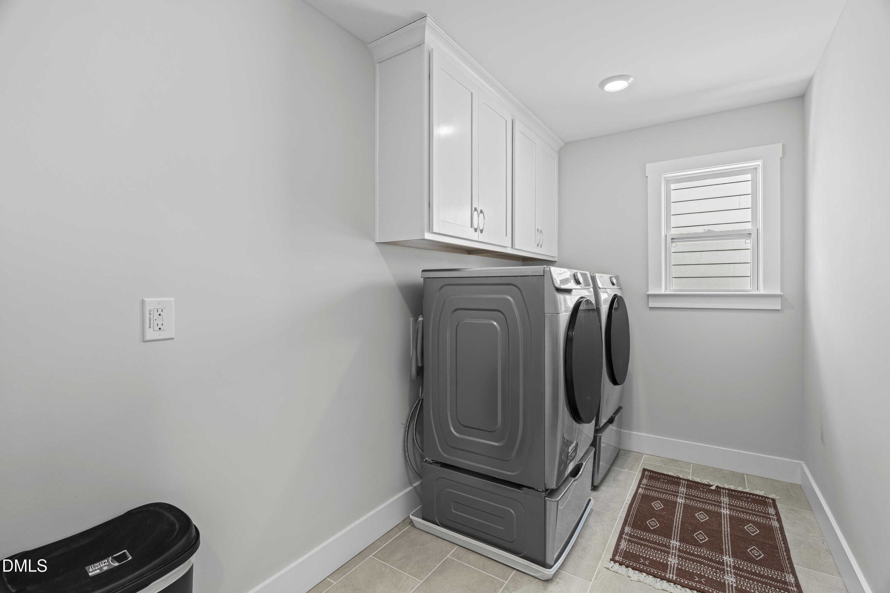108 Bridge Street Smithfield, NC 27577 - Photo 34 of 48 a utility room with wooden floor washer and dryer