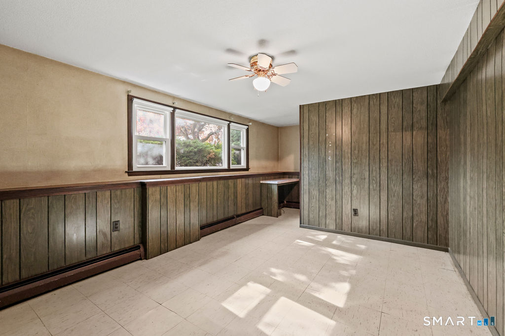 142 Wolcott Hill Road Wethersfield, CT 06109 - Photo 22 of 29 a view of a room with a large window