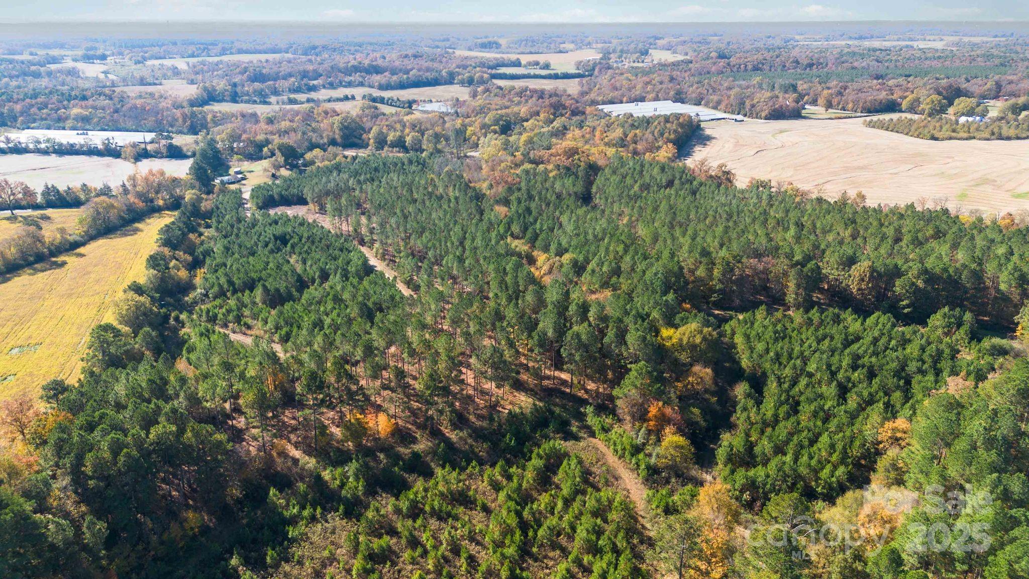 Tbd Deep Springs Road Marshville, NC 28103 - Photo 10 of 12 an aerial view of residential houses with outdoor space and trees