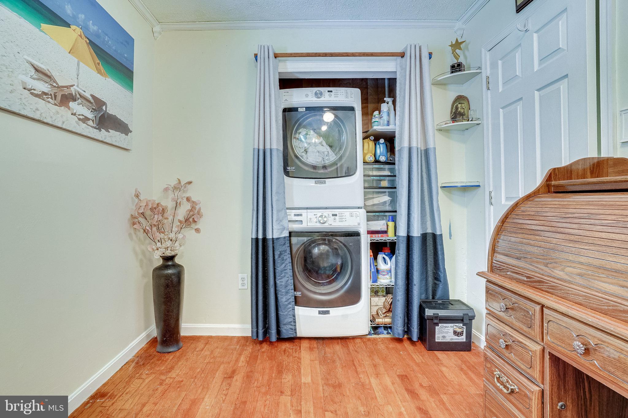 8729 Redman Street Springfield, VA 22153 - Photo 16 of 23 Stackable washer/dryer on main level in bedroom 3