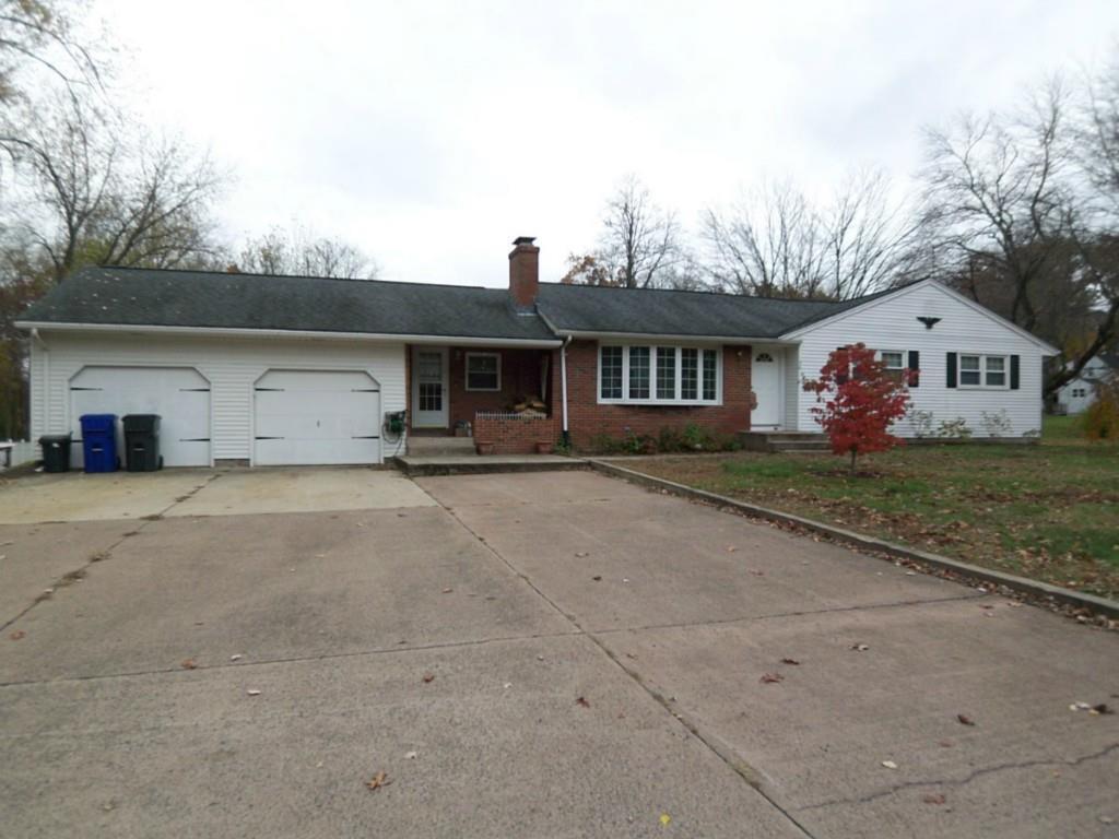 30 Woolam Road East Windsor, CT 06088 - Photo 1 of 1 a front view of a house with a yard