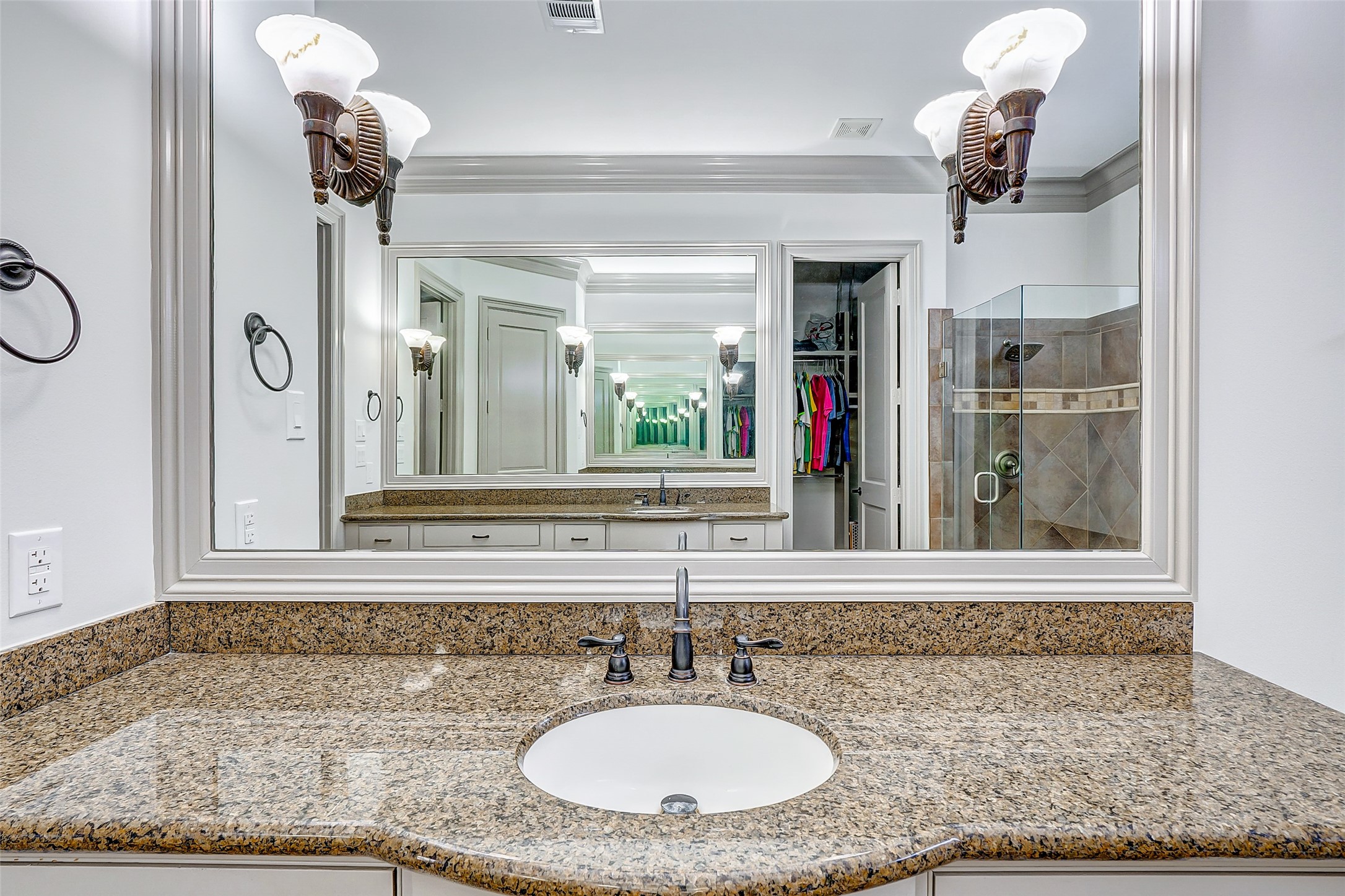 2702 Tudor Manor Houston, TX 77082 - Photo 15 of 25 a bathroom with a granite countertop sink and a mirror