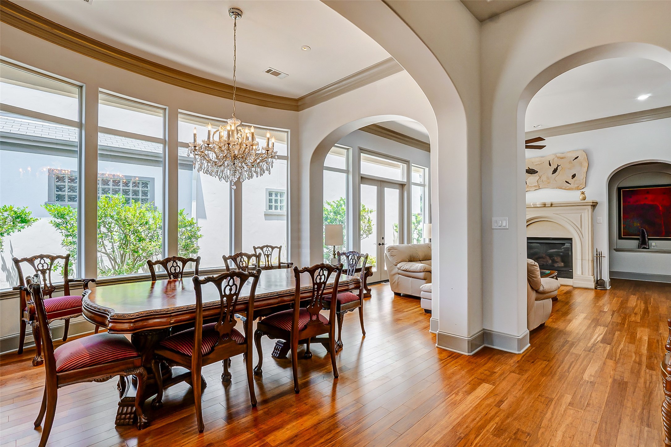 2702 Tudor Manor Houston, TX 77082 - Photo 3 of 25 a view of a dining room with furniture window and wooden floor