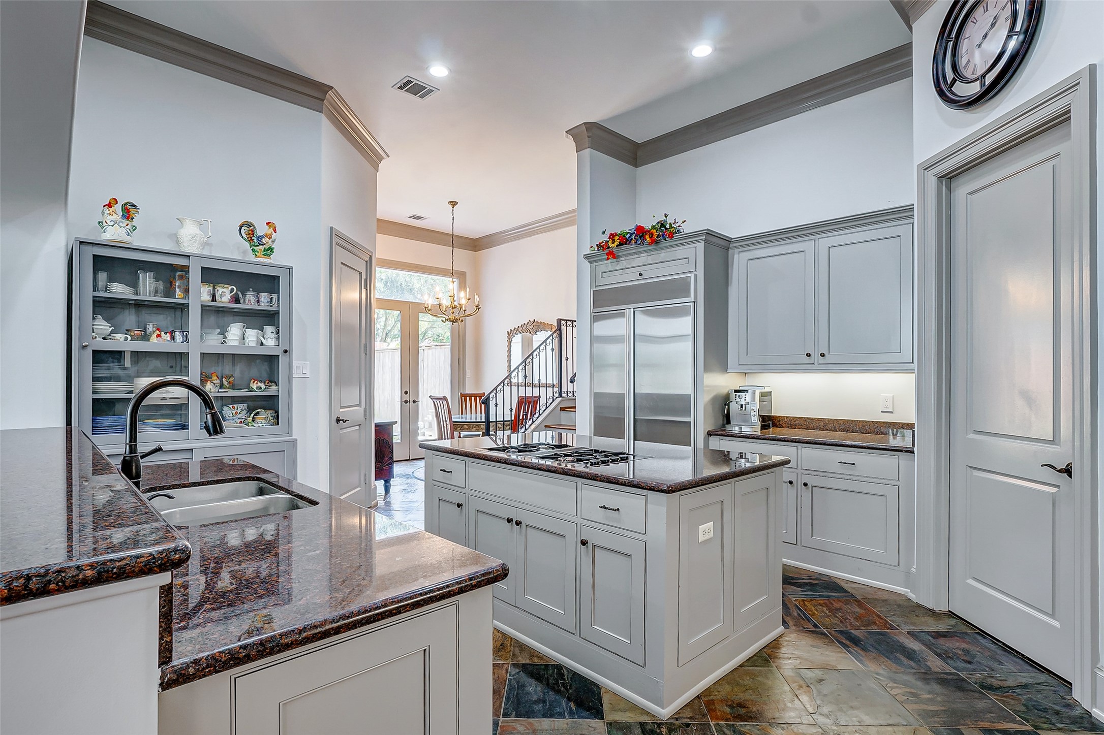 2702 Tudor Manor Houston, TX 77082 - Photo 7 of 25 a kitchen with a sink appliances and cabinets