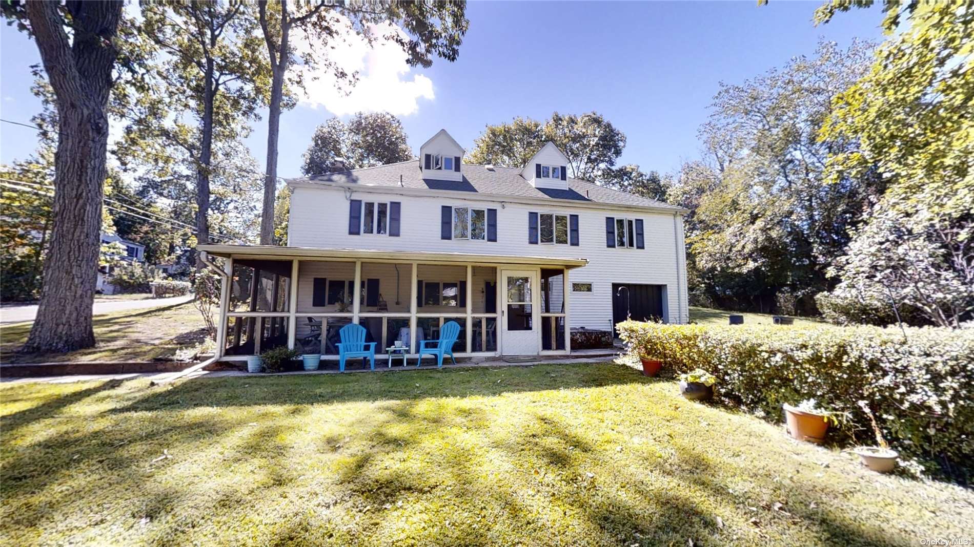 31 Triton Road Rocky Point, NY 11778 - Photo 1 of 1 a view of a large building with a large pool and large trees