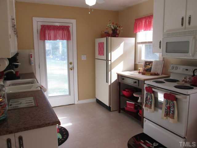 5507 Meadowbrook Road Raleigh, NC 27603 - Photo 17 of 25 Your kitchen is a nice size and features updated counter tops, a built in microwave, dishwasher, pantry is perfect for added storage space of groceries, and eat-in breakfast area features built in corner shelves!