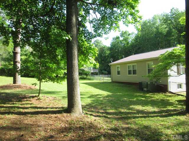 5507 Meadowbrook Road Raleigh, NC 27603 - Photo 6 of 25 Fantastic back yard is nice and level and would make a great spot for a garden, plenty of space for kids to play, and lots of room for your pets too!