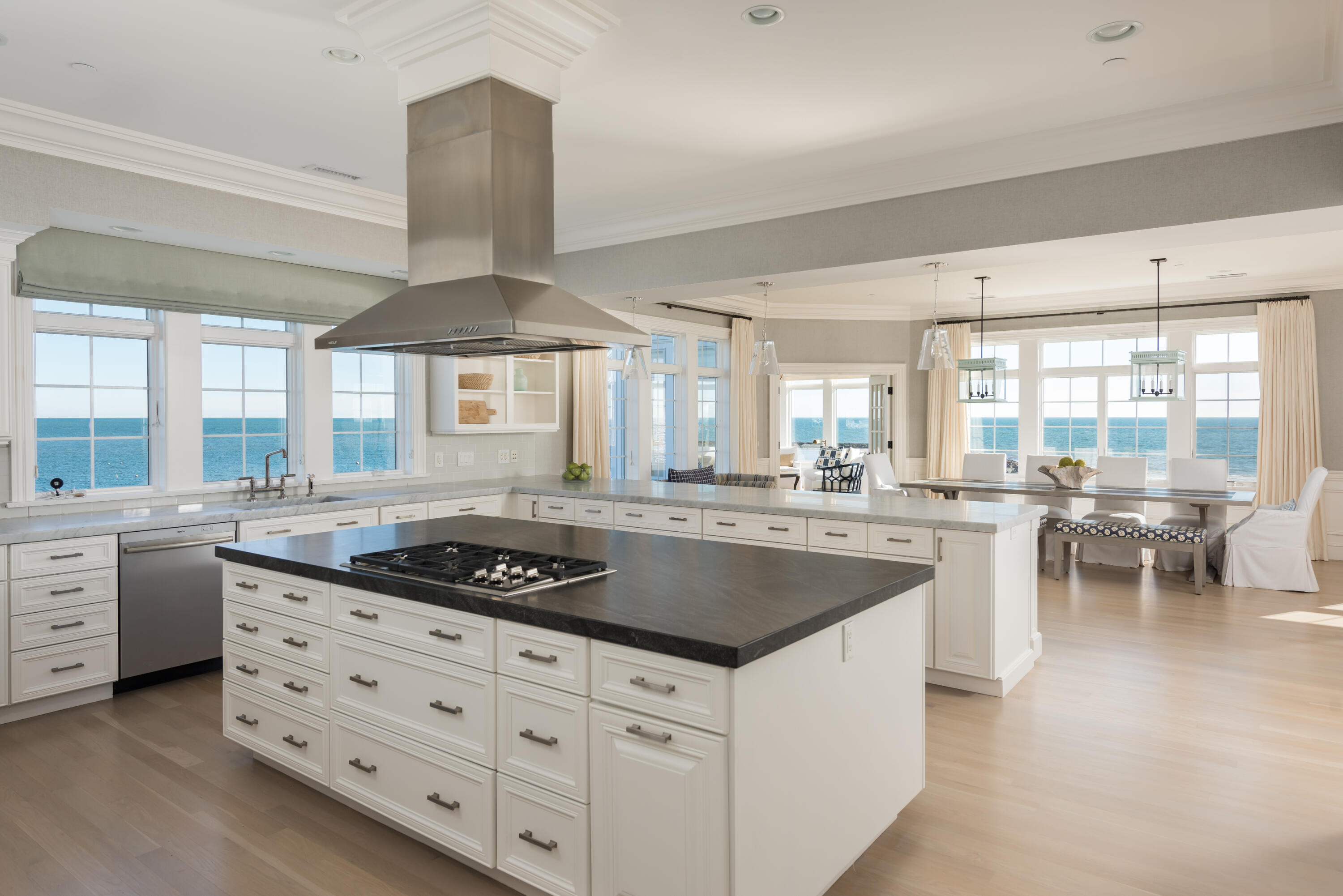 23 Snow Inn Road, Unit 2 Harwich Port, MA 02646 - Photo 20 of 40 a kitchen with stainless steel appliances granite countertop a stove and white cabinets