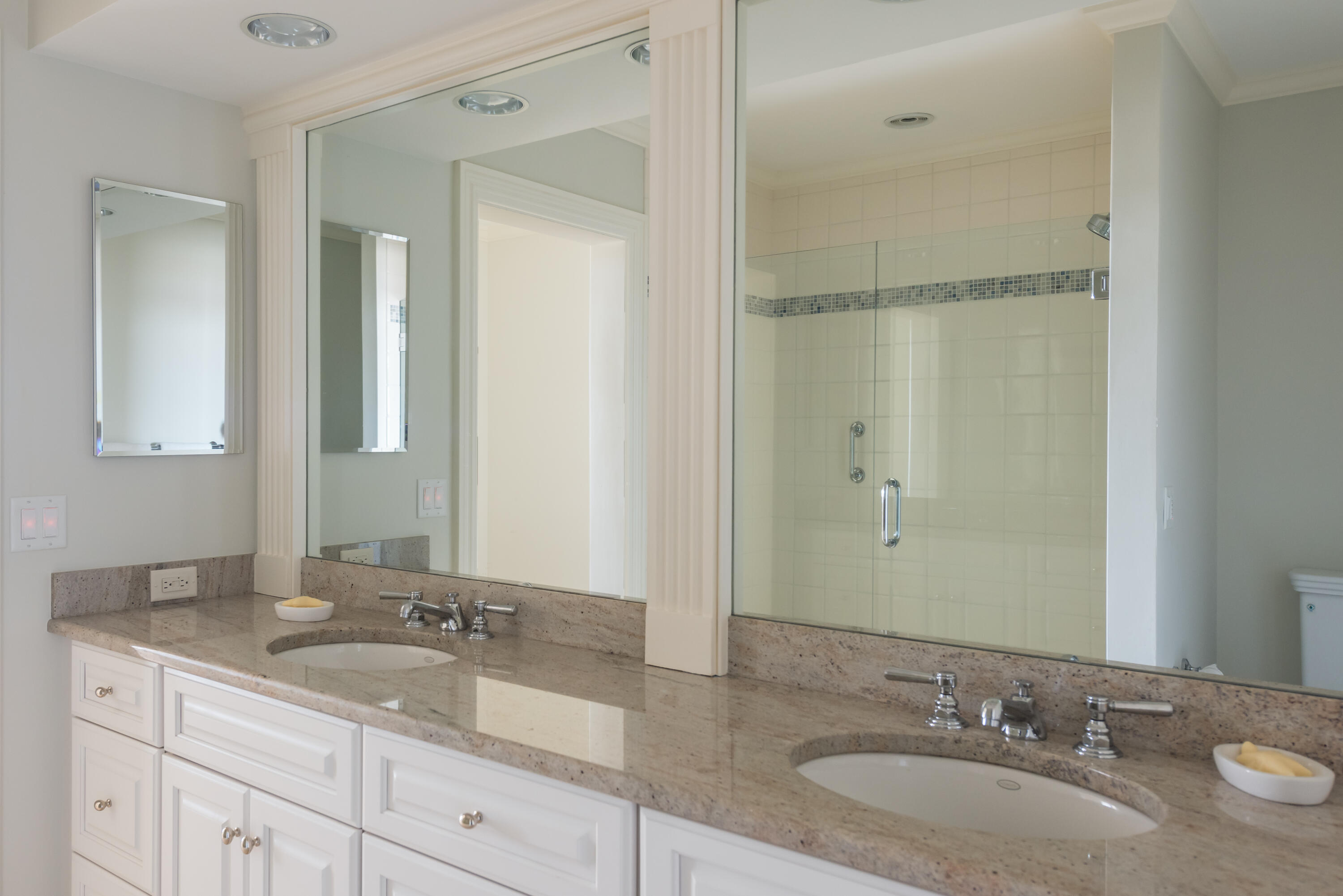 23 Snow Inn Road, Unit 2 Harwich Port, MA 02646 - Photo 29 of 40 a bathroom with a granite countertop sink and a mirror