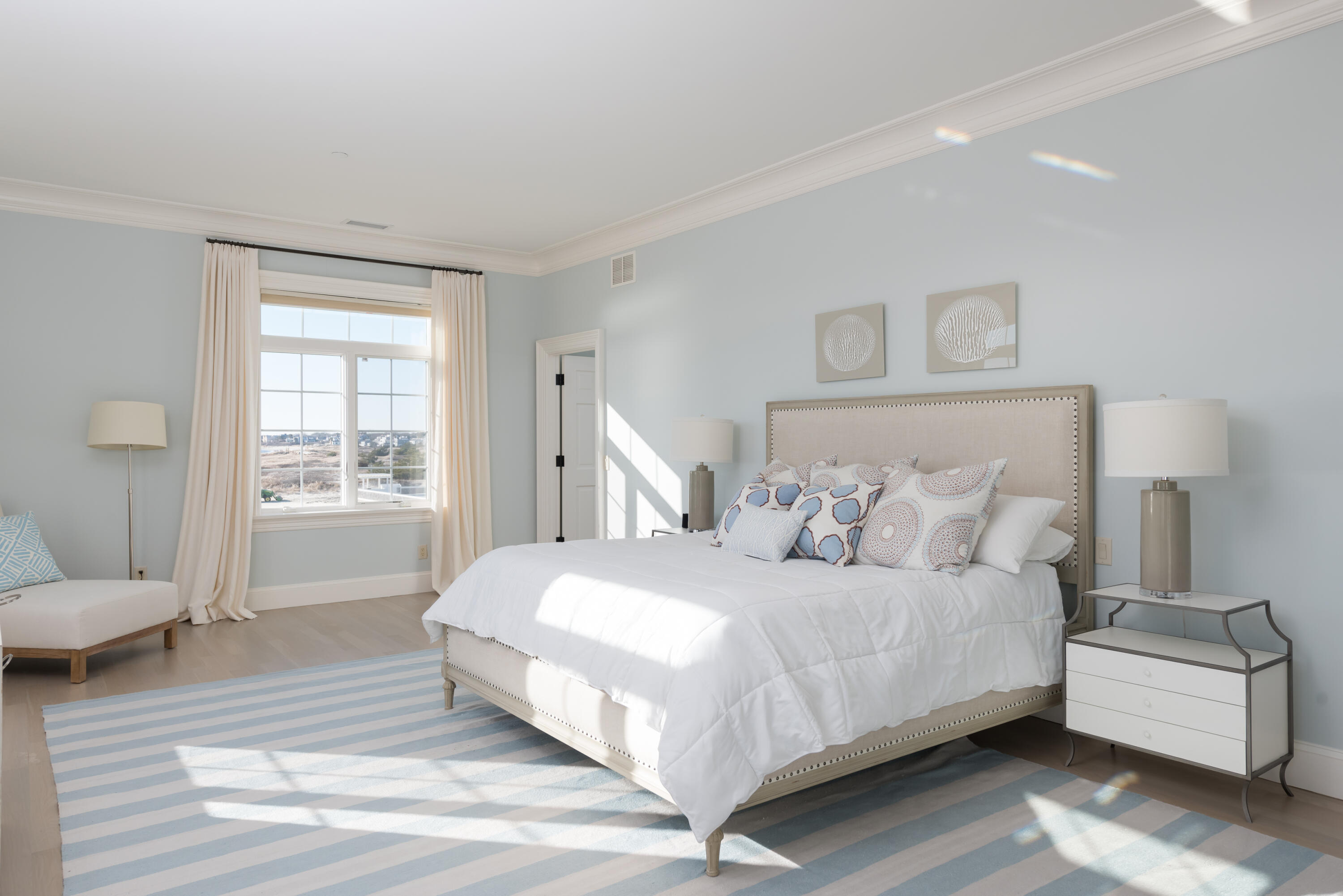 23 Snow Inn Road, Unit 2 Harwich Port, MA 02646 - Photo 32 of 40 a bedroom with a bed and a couch