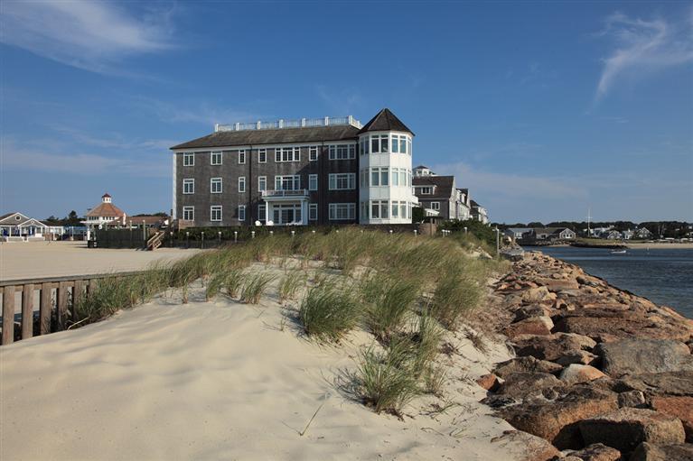 23 Snow Inn Road, Unit 2 Harwich Port, MA 02646 - Photo 39 of 40 a view of a house with a yard