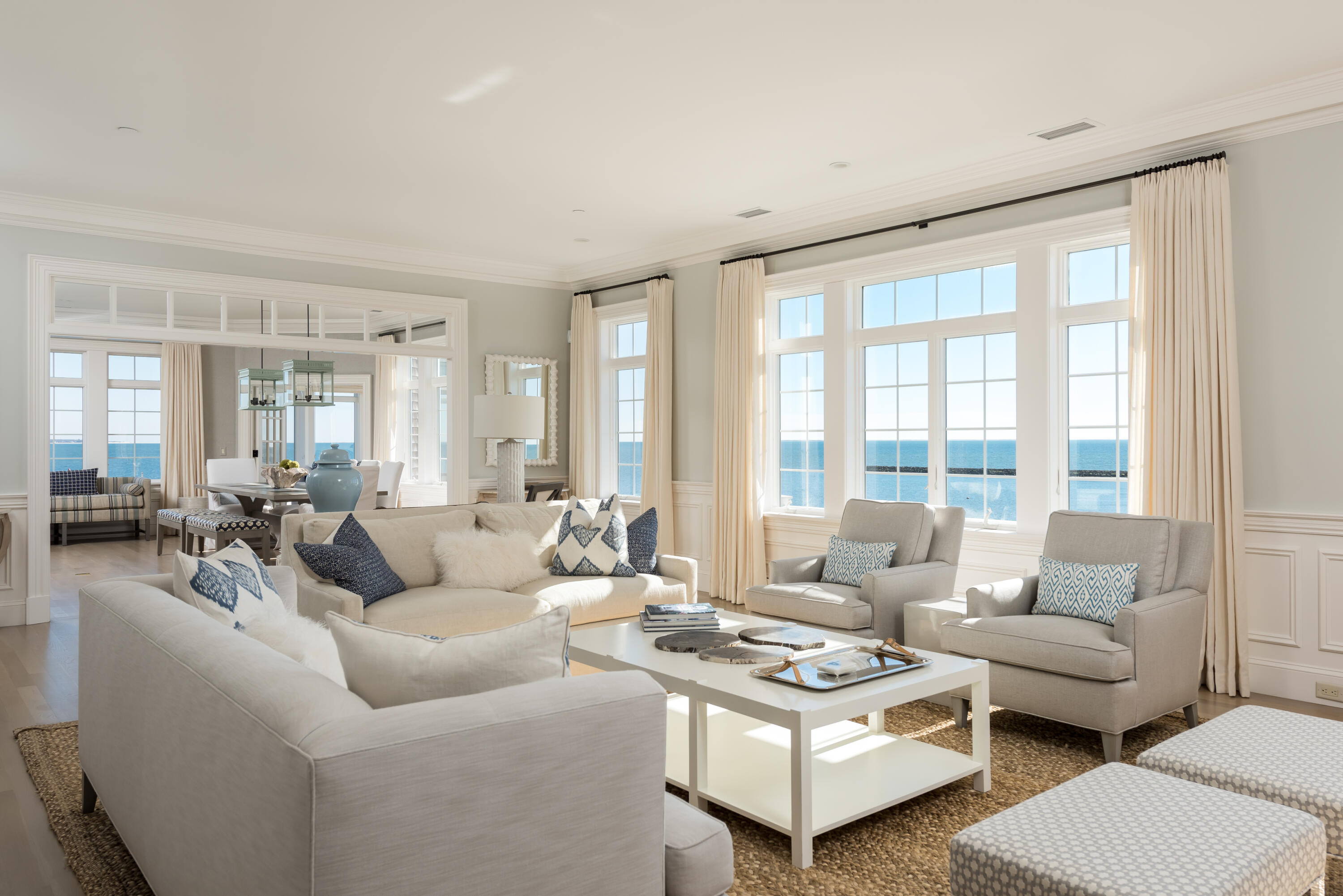 23 Snow Inn Road, Unit 2 Harwich Port, MA 02646 - Photo 8 of 40 a living room with furniture and a large window