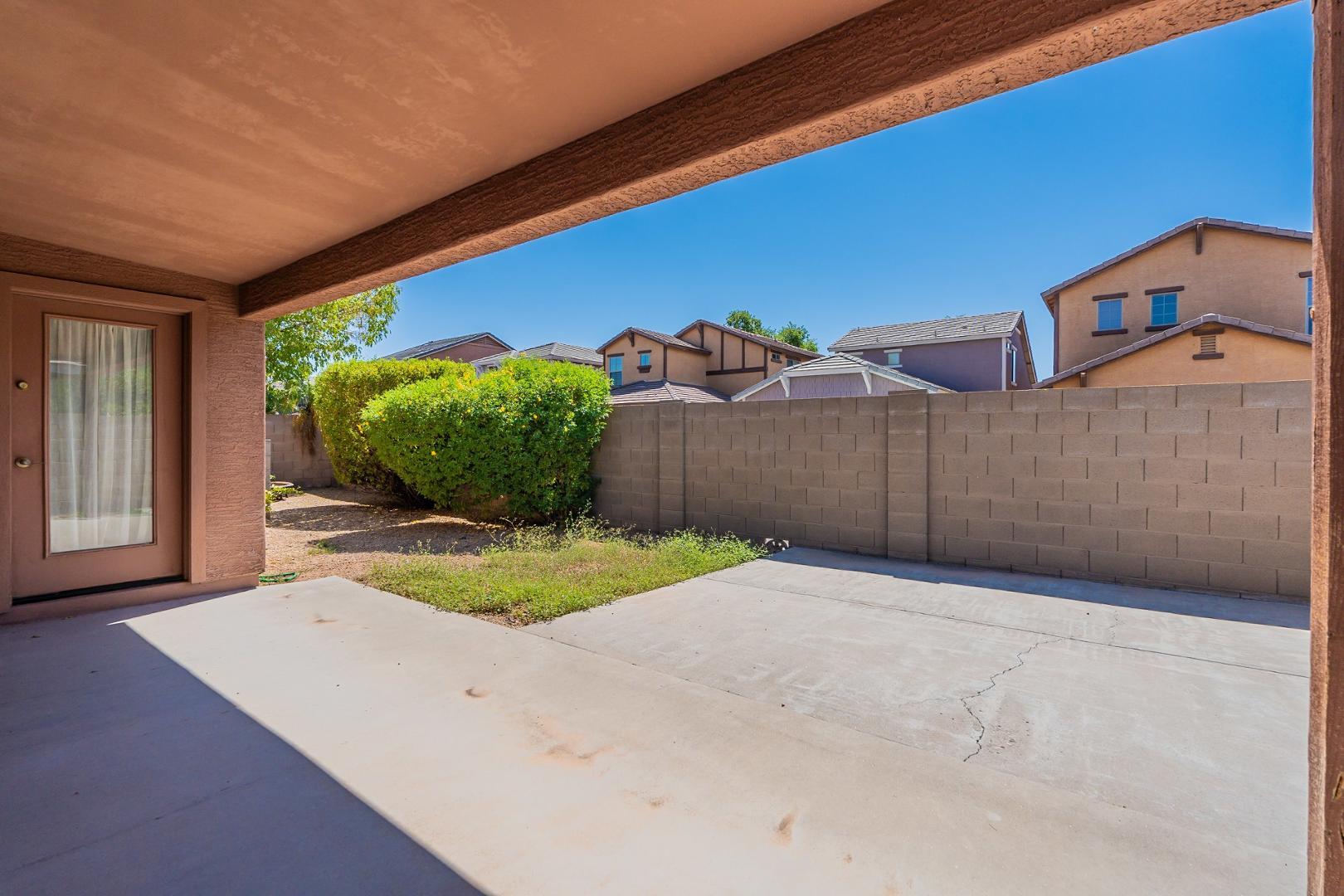 3713 East Utopia Road Phoenix, AZ 85050 - Photo 41 of 47 a backyard of a house