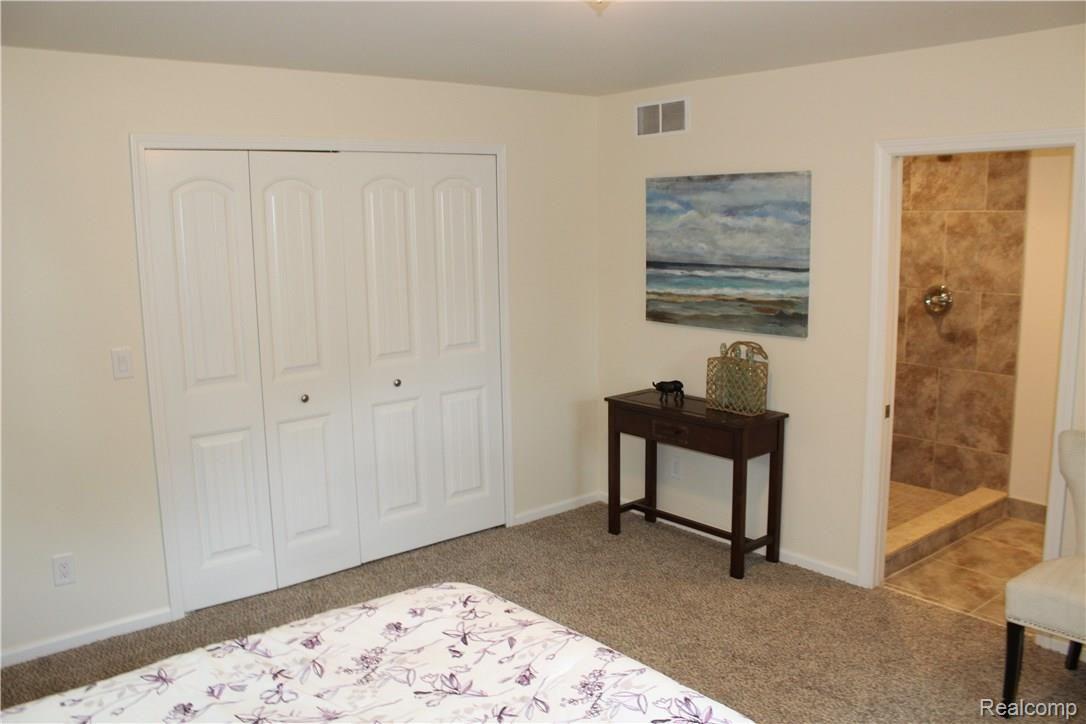 8869 Inkster Road Livonia, MI 48150 - Photo 8 of 17 Master Bedroom with Full Bath