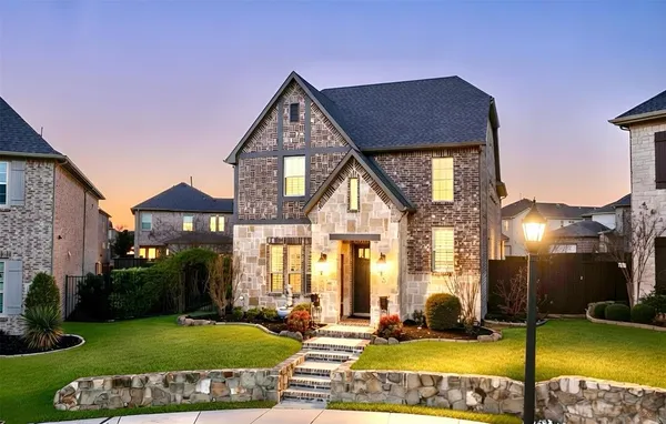 a view of a house with swimming pool and a yard