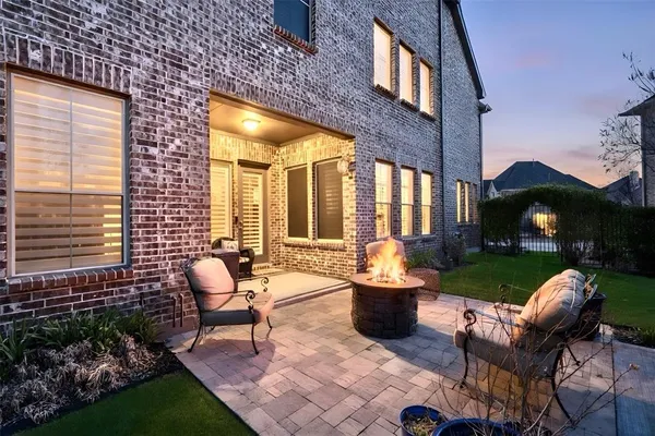 a outdoor space with patio furniture and a garden