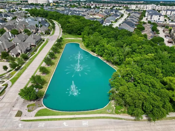 a view of a yard with a swimming pool