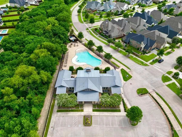 an aerial view of a house with a garden