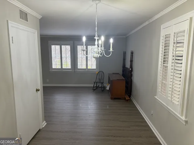 a room with window and stairs