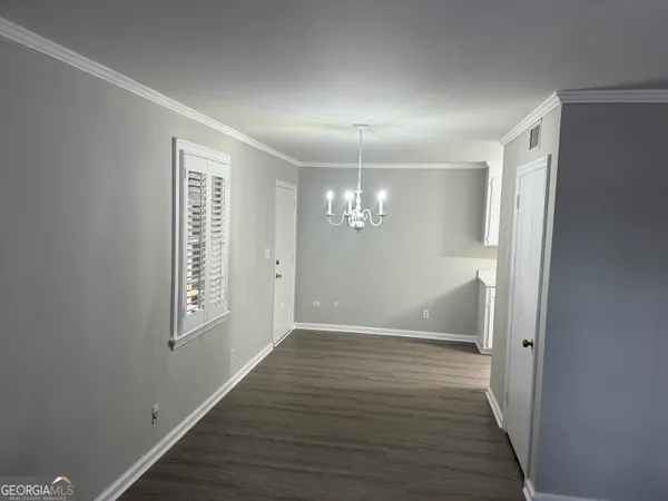 a view of livingroom with hardwood floor and window