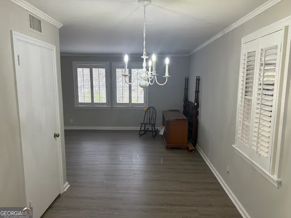 a room with window and stairs