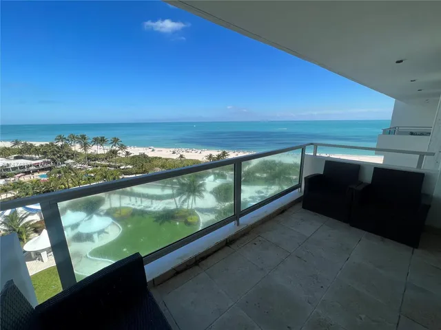 a view of balcony with ocean
