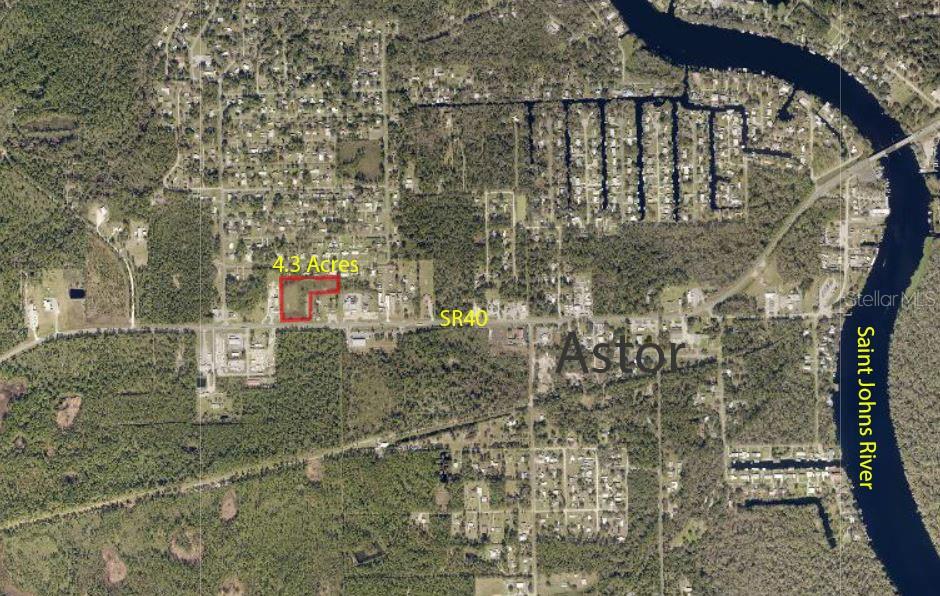 40 Highway 40 Astor, FL 32102 - Photo 1 of 1 a picture of street with yard