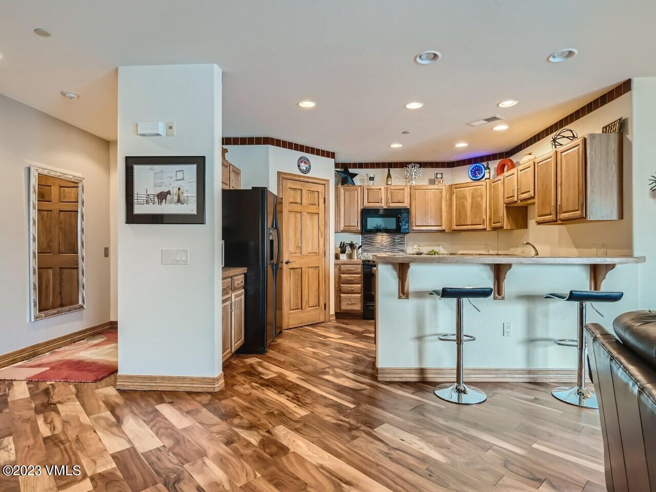 225 Main Street, Unit R203 Edwards, CO 81632 - Photo 8 of 24 View to Kitchen