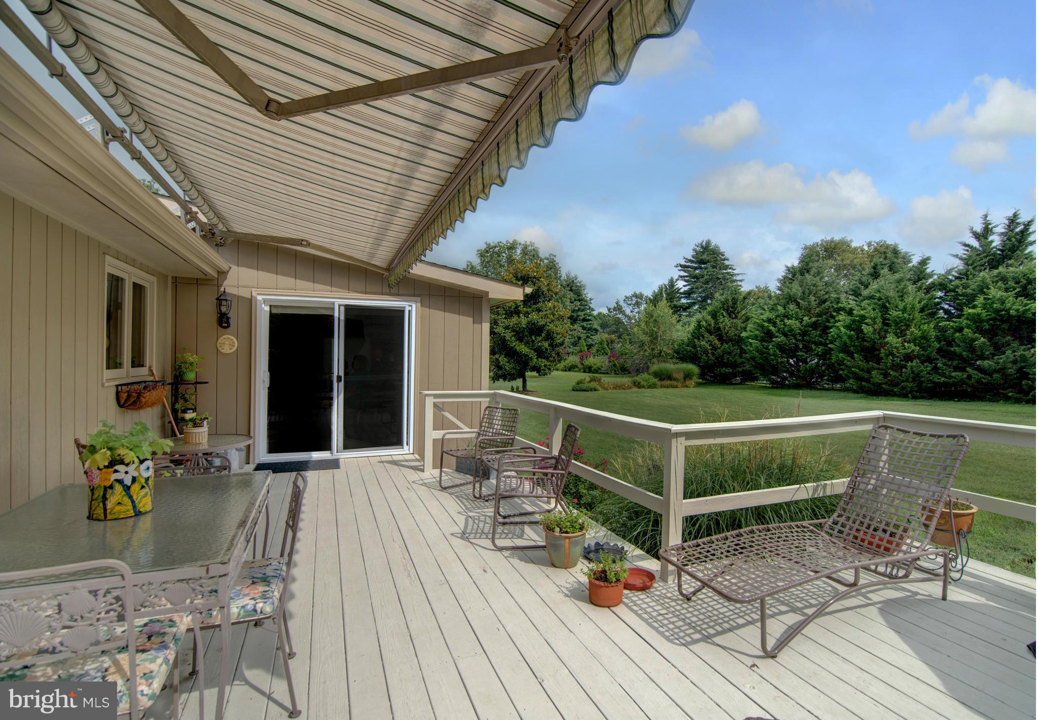 7850 Radcliffe Road Chestertown, MD 21620 - Photo 18 of 23 Deck with entry to Sunroom