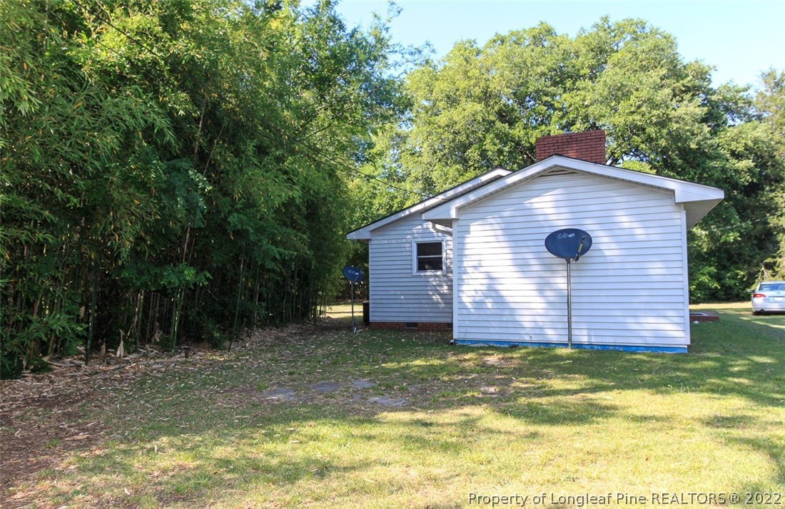 85 McIntyre Road Pinehurst, NC 28374 - Photo 19 of 20 a view of a backyard of house