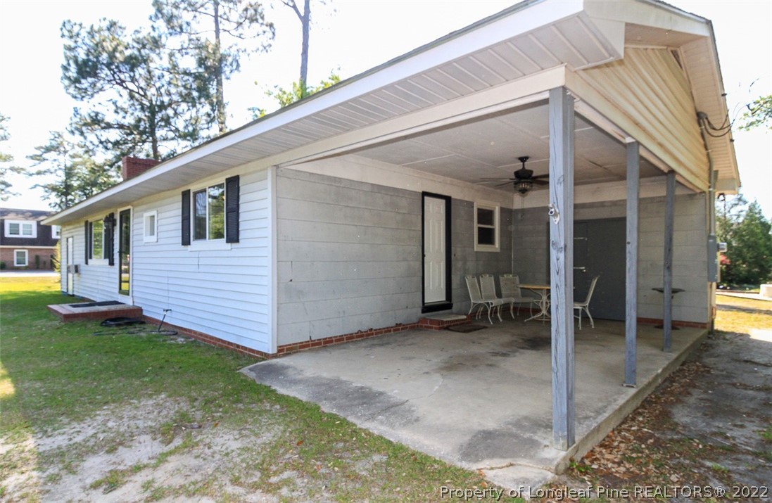 85 McIntyre Road Pinehurst, NC 28374 - Photo 3 of 20 a view of a house with backyard