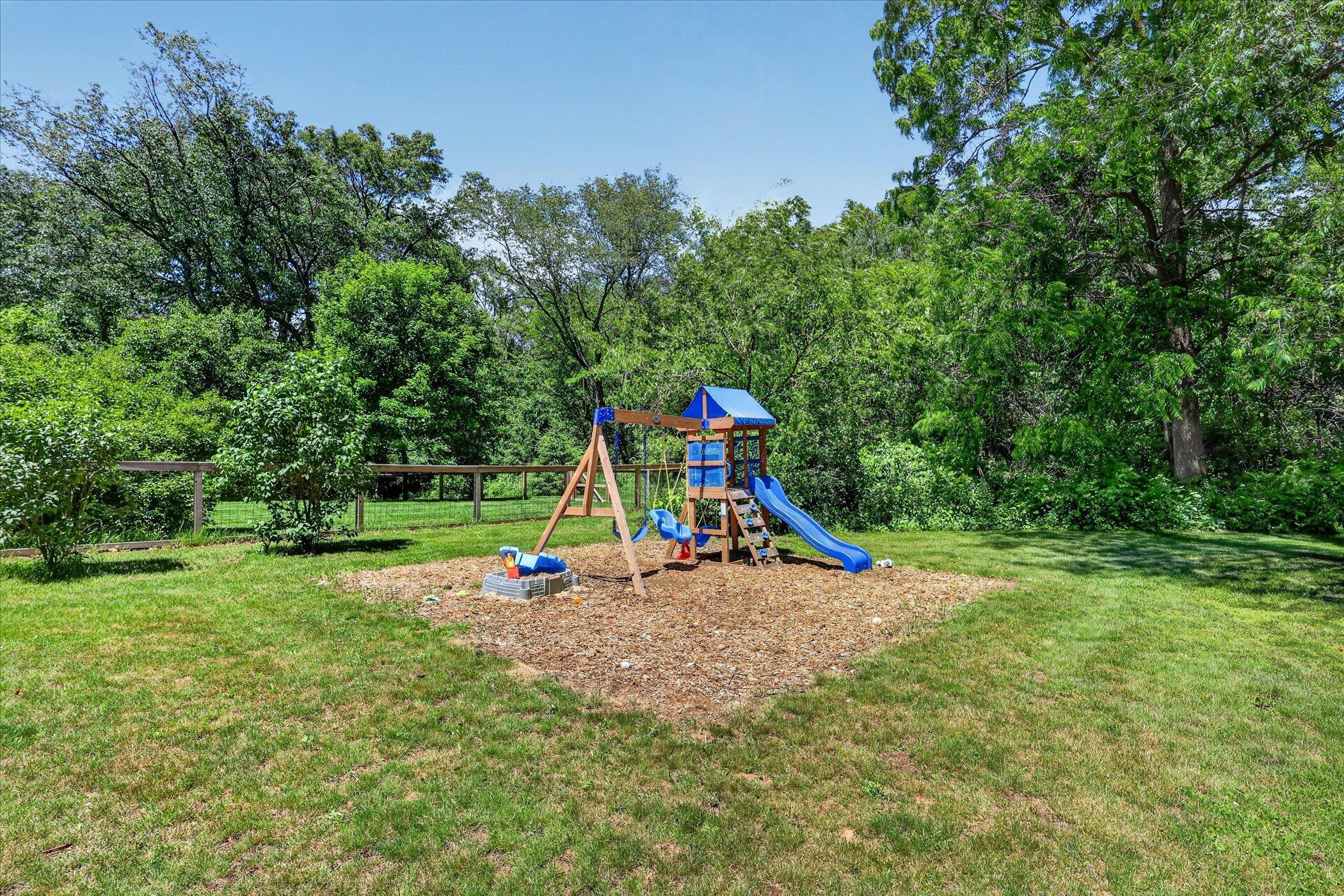 8669 Lilly Ridge Drive Alto, MI 49302 - Photo 48 of 53 49-8669-Lilly-Ridge-Dr-Alto-WindowStill