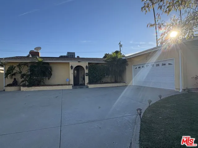 a view of a house with a garage