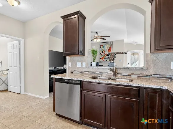 a kitchen with a sink and a cabinets