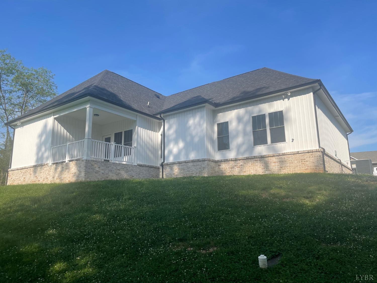 1051 Wills Way Forest, VA 24551 - Photo 22 of 49 a front view of house with yard