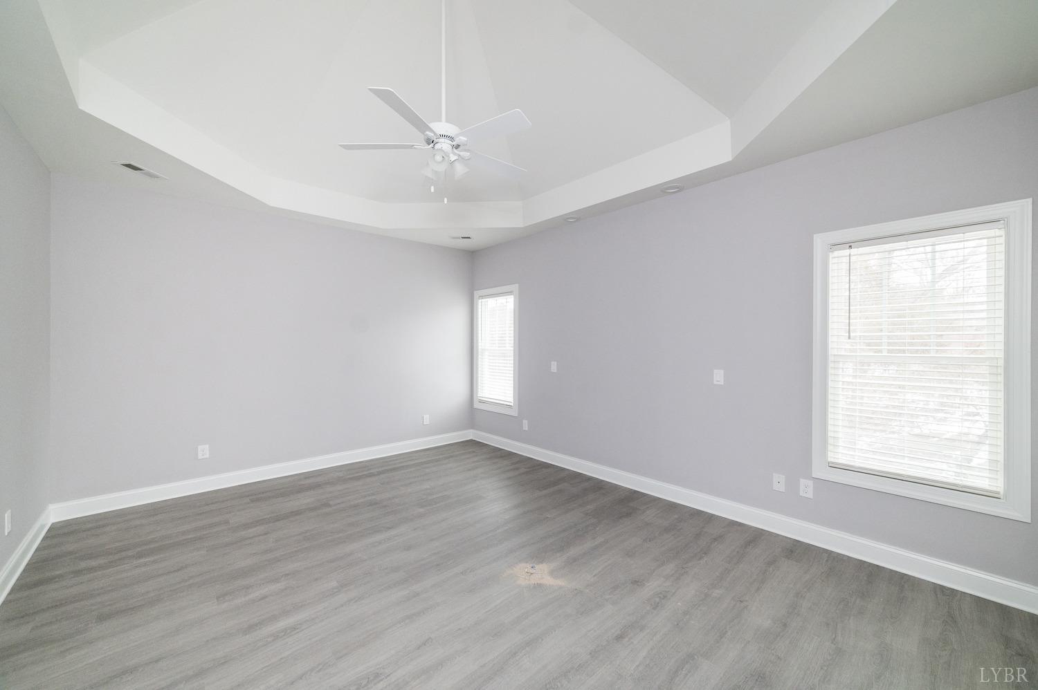 1051 Wills Way Forest, VA 24551 - Photo 32 of 49 a view of an empty room with wooden floor and a window
