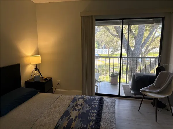 a view of a hallway with a room