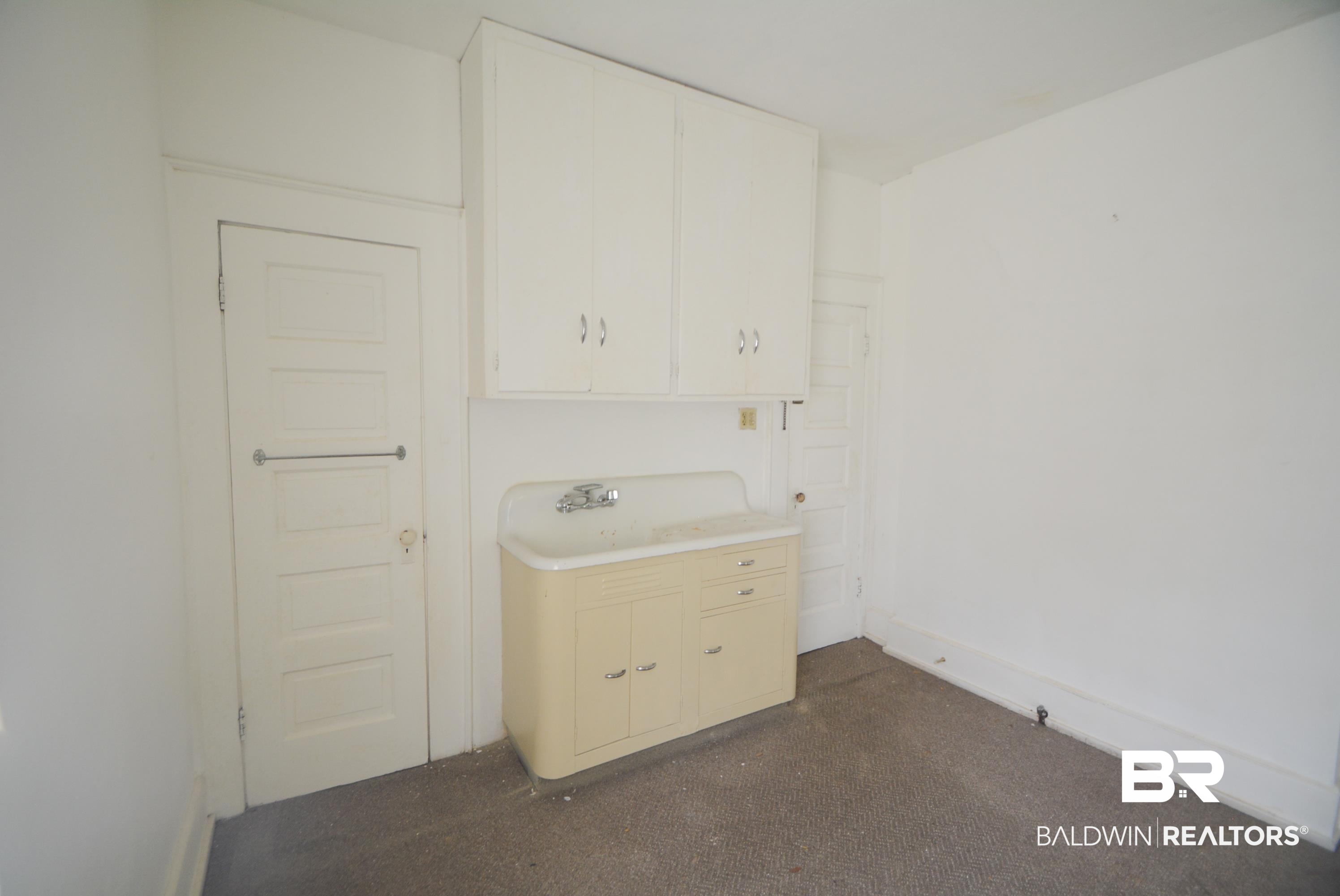 327 7th Street Chickasaw, AL 36611 - Photo 11 of 15 upstairs kitchen
