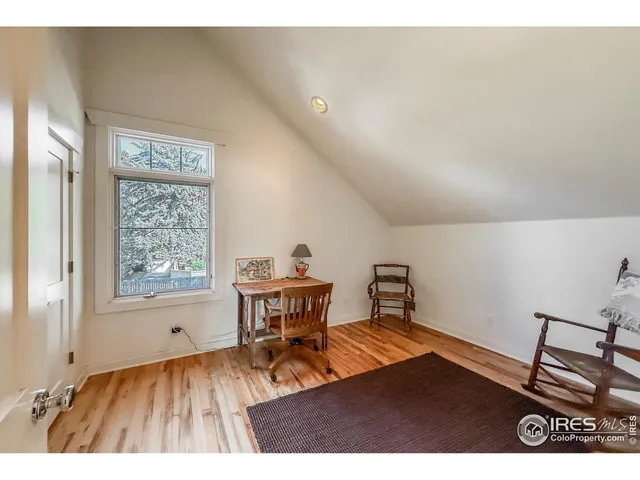 a view of backyard with outdoor seating ad green space