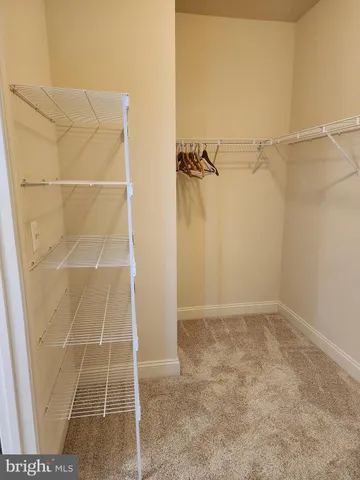 a bathroom with a toilet sink and shower