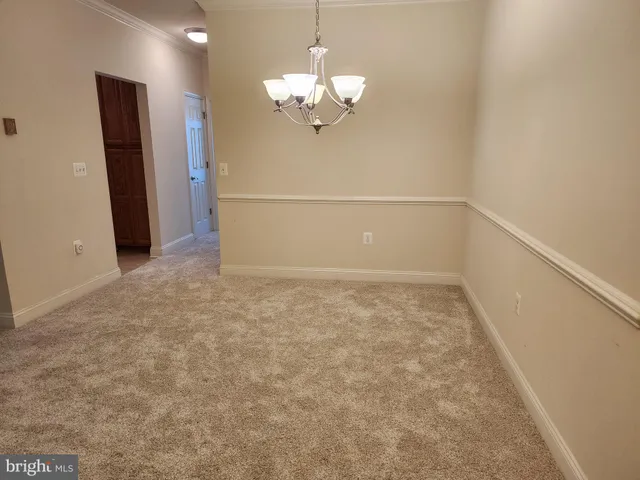 a view of a livingroom with a chandelier