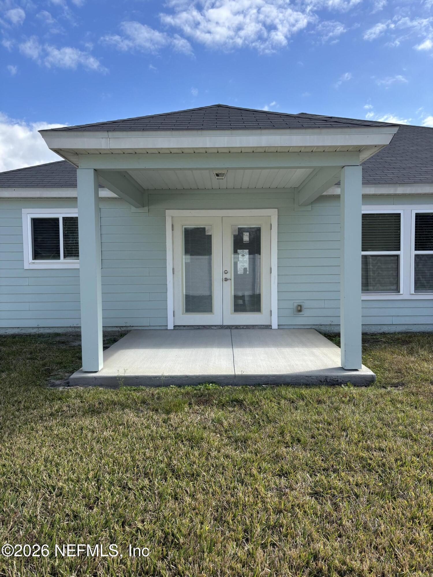 8280 Fouraker Forest Road Jacksonville, FL 32221 - Photo 21 of 25 front view of a house with a yard