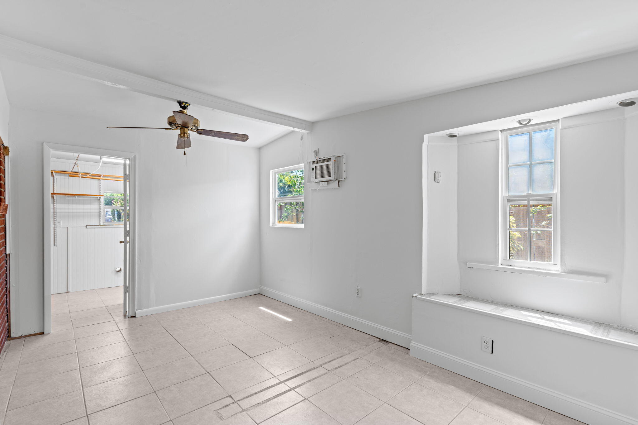 3852 Catalina Road Palm Beach Gardens, FL 33410 - Photo 23 of 48 a view of an empty room with a window