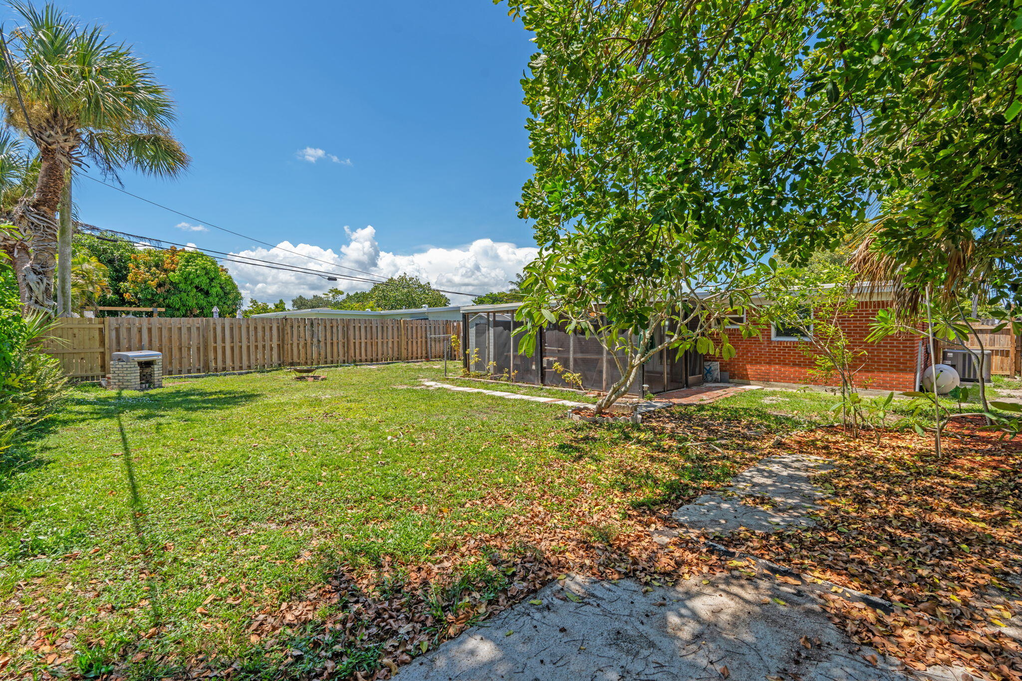 3852 Catalina Road Palm Beach Gardens, FL 33410 - Photo 26 of 48 a view of backyard with green space