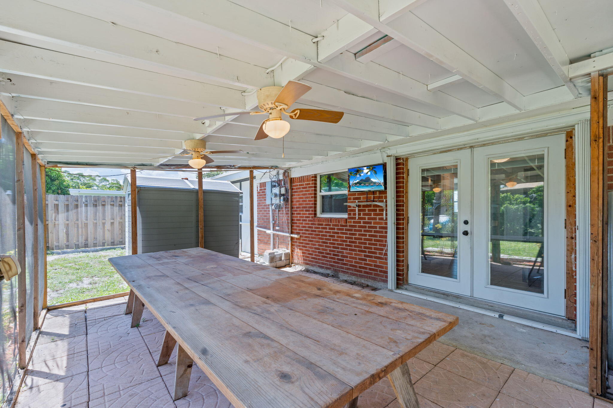 3852 Catalina Road Palm Beach Gardens, FL 33410 - Photo 28 of 48 a view of a wooden deck