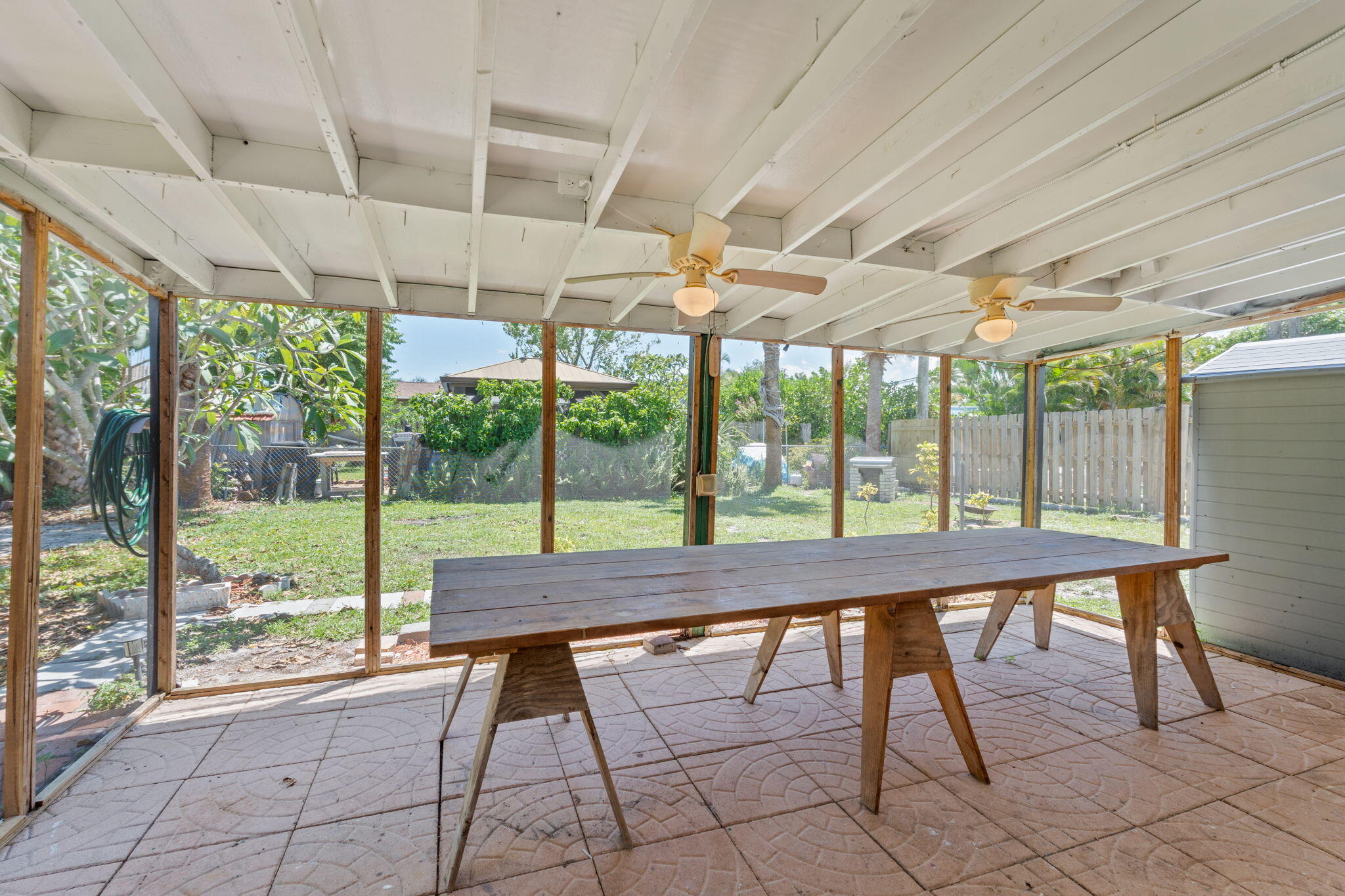 3852 Catalina Road Palm Beach Gardens, FL 33410 - Photo 30 of 48 a room with a large window