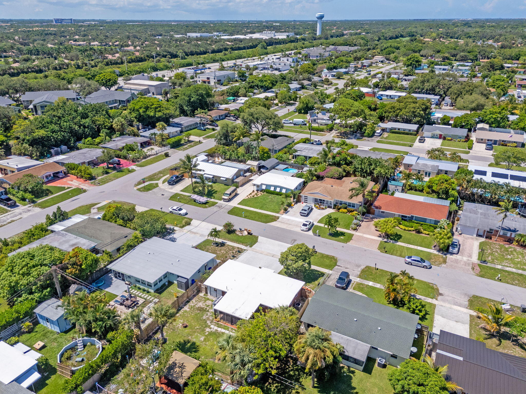 3852 Catalina Road Palm Beach Gardens, FL 33410 - Photo 36 of 48 an aerial view of residential houses with outdoor space