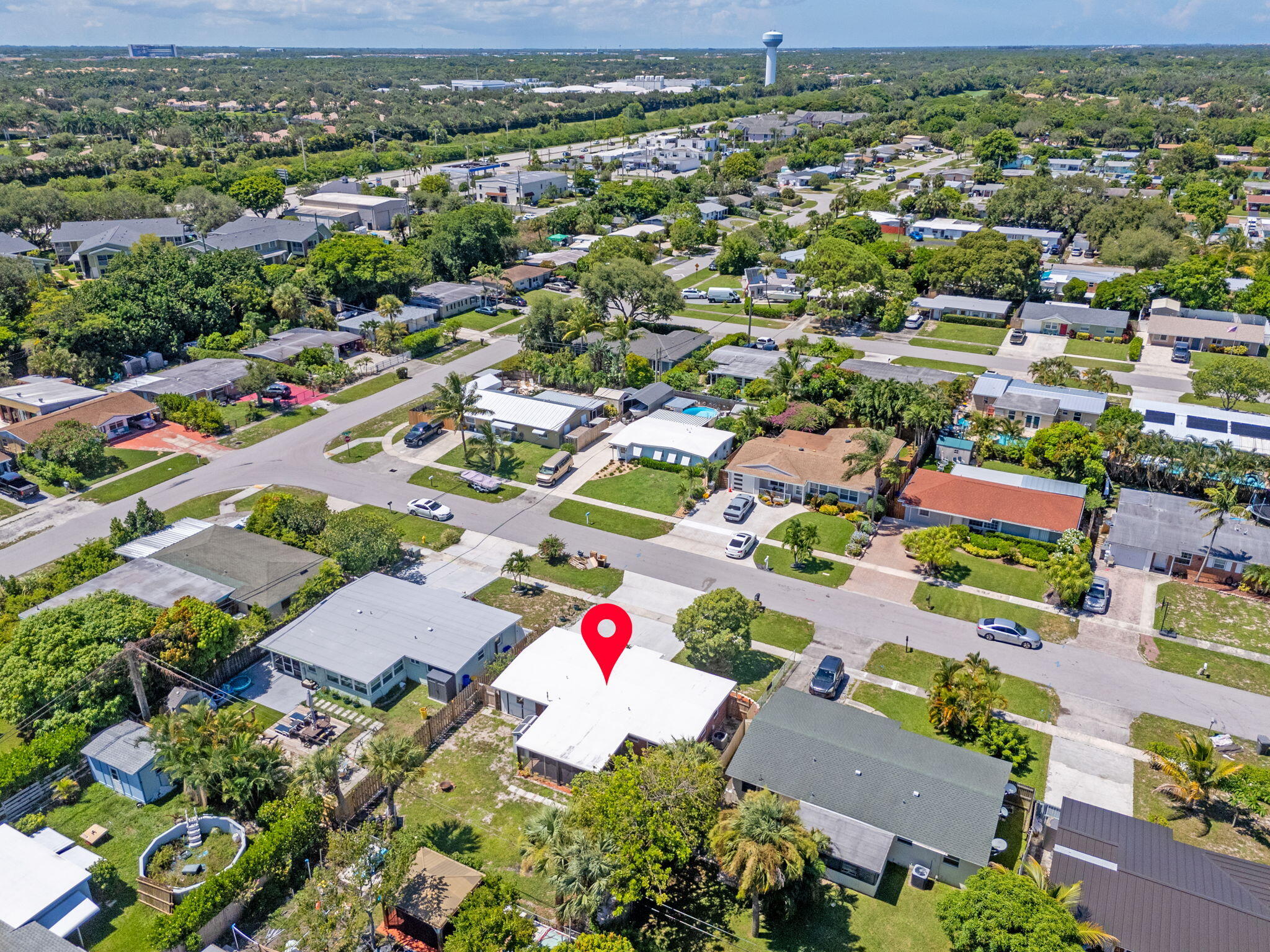 3852 Catalina Road Palm Beach Gardens, FL 33410 - Photo 37 of 48 an aerial view of residential houses with outdoor space